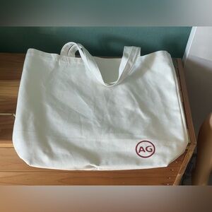 AG Adriano Goldschmeid Tote Bag Off White Canvas Logo 14x15.5x5”